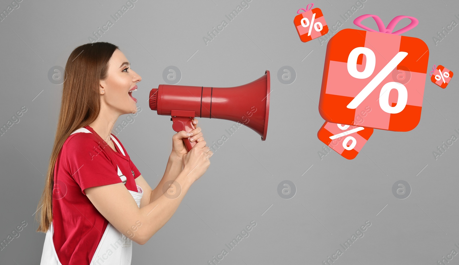 Image of Discount offer. Woman shouting into megaphone on grey background. Gift boxes with percent signs coming out from device