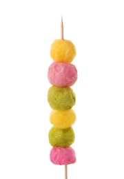 Photo of Skewer with color cotton balls isolated on white. Sweet candy