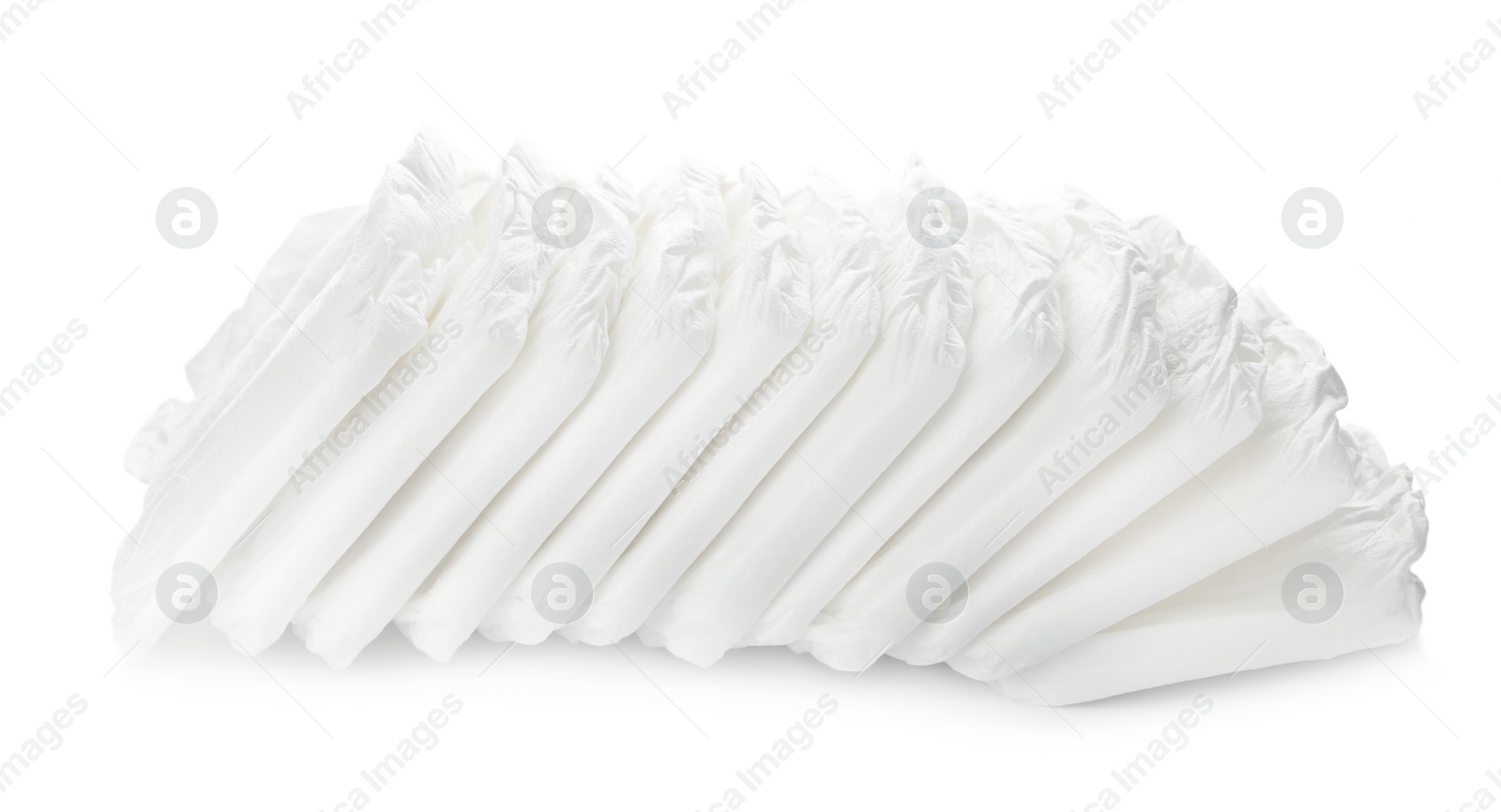 Photo of Pile of baby diapers isolated on white