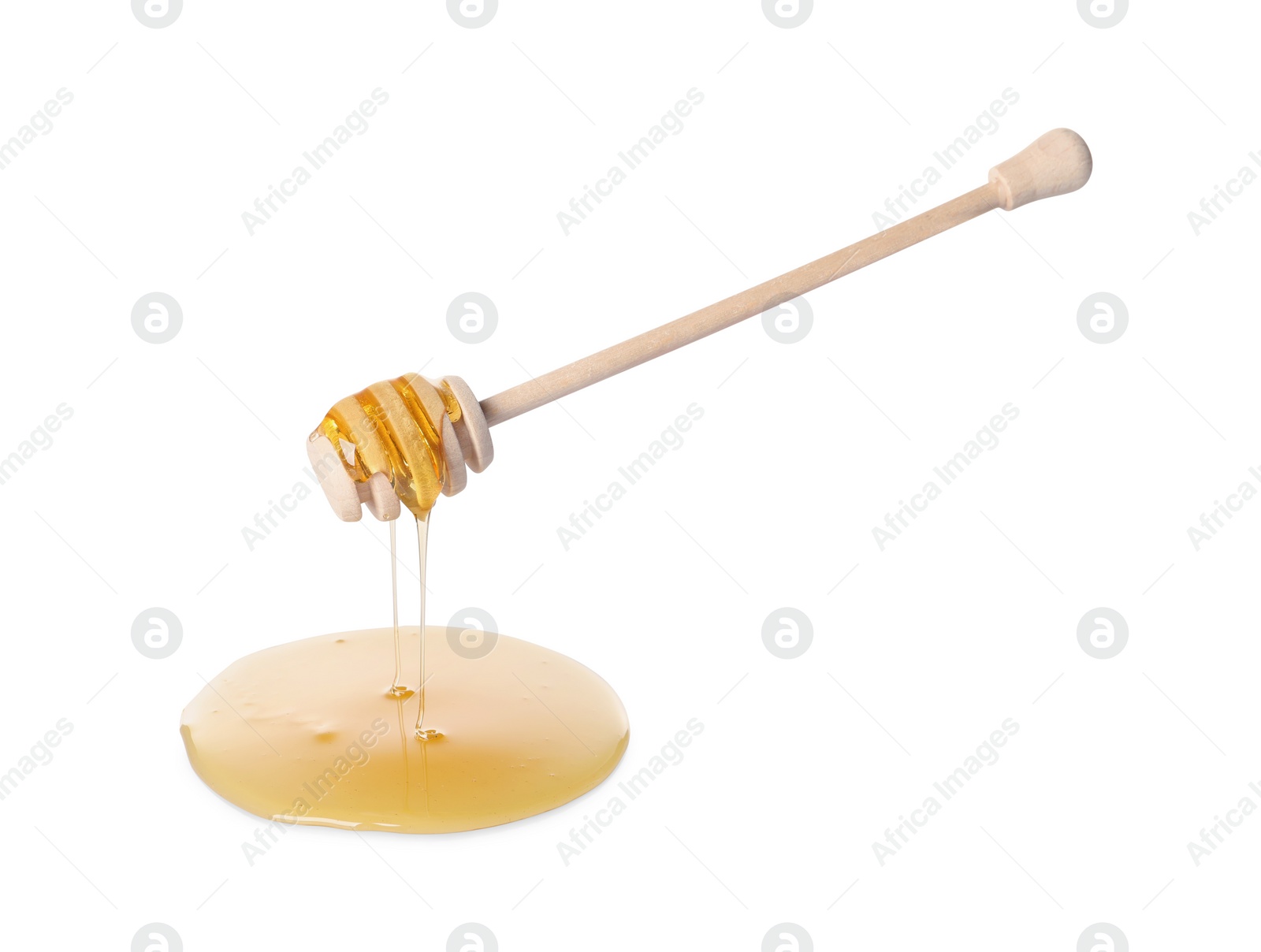 Photo of Fresh honey dripping from dipper on white background