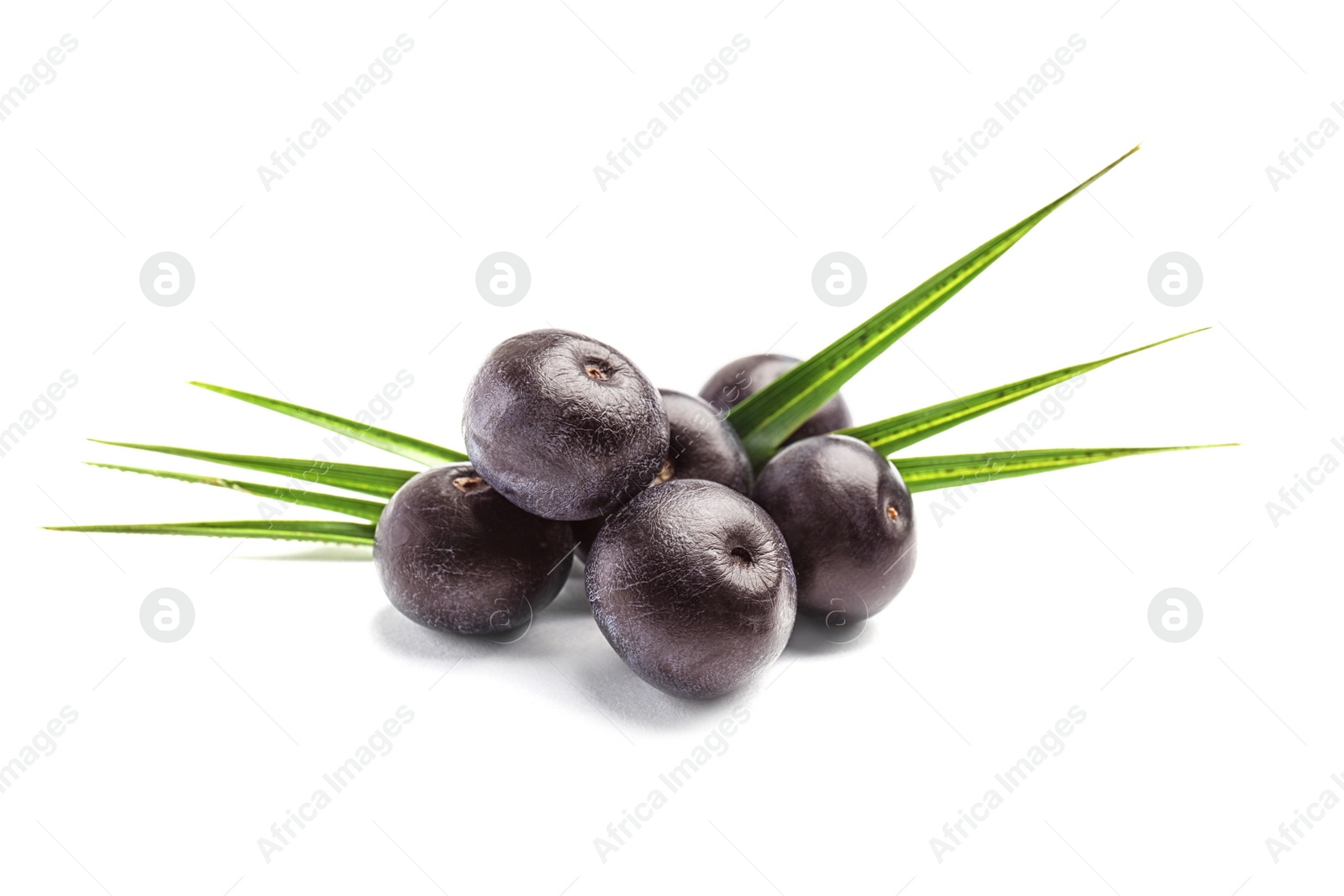 Photo of Fresh acai berries with leaves on white background