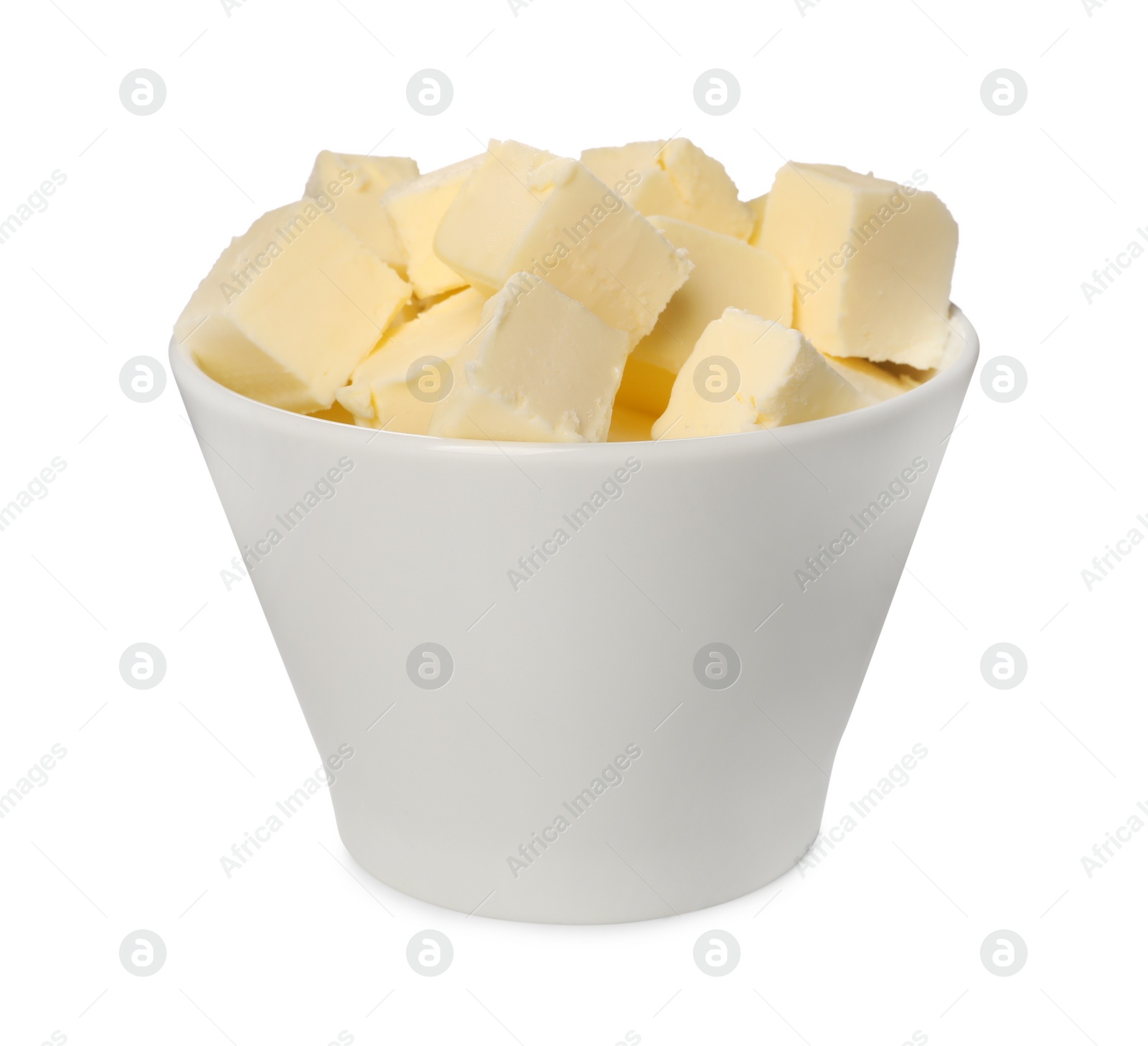 Photo of Tasty butter cubes in bowl isolated on white