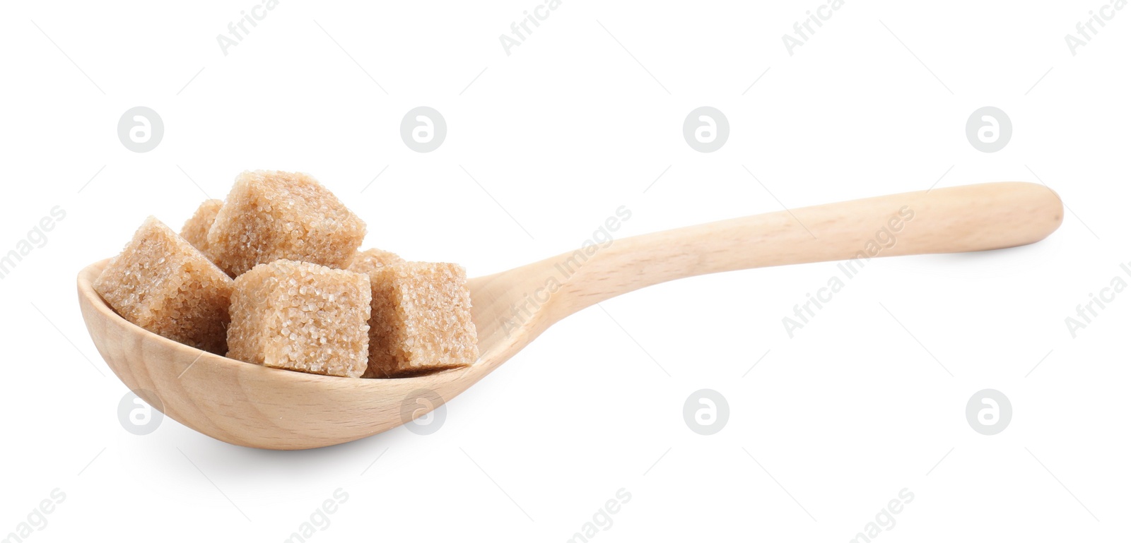 Photo of Brown sugar cubes in wooden spoon isolated on white