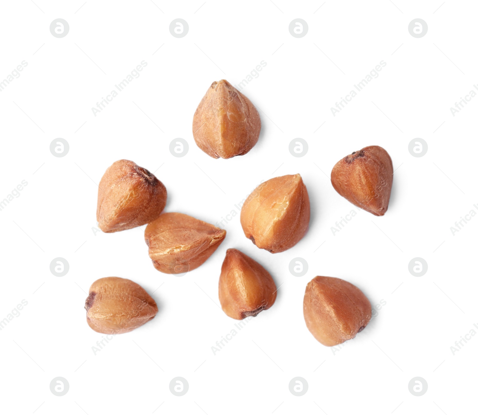 Photo of Buckwheat grains isolated on white, top view. Organic cereal