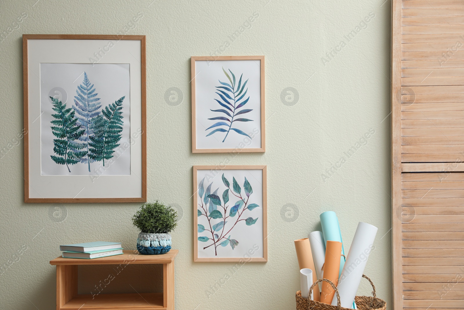 Photo of Stylish room interior design with floral paintings