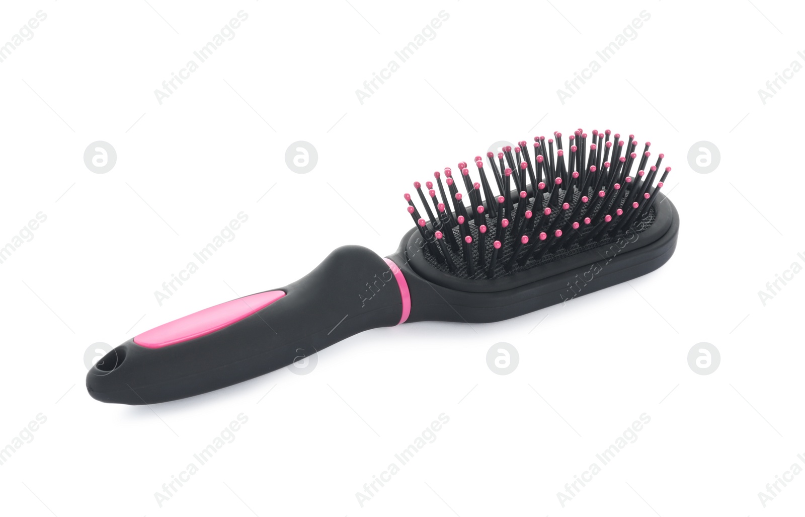 Photo of New modern hair brush isolated on white