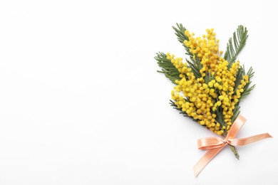 Photo of Beautiful mimosa bouquet on white background, top view. Space for text