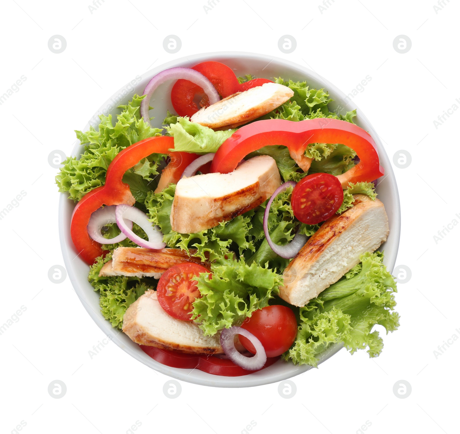 Photo of Delicious salad with chicken and vegetables in bowl isolated on white, top view