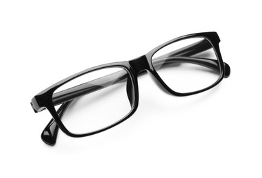 Photo of Stylish glasses with black frame isolated on white