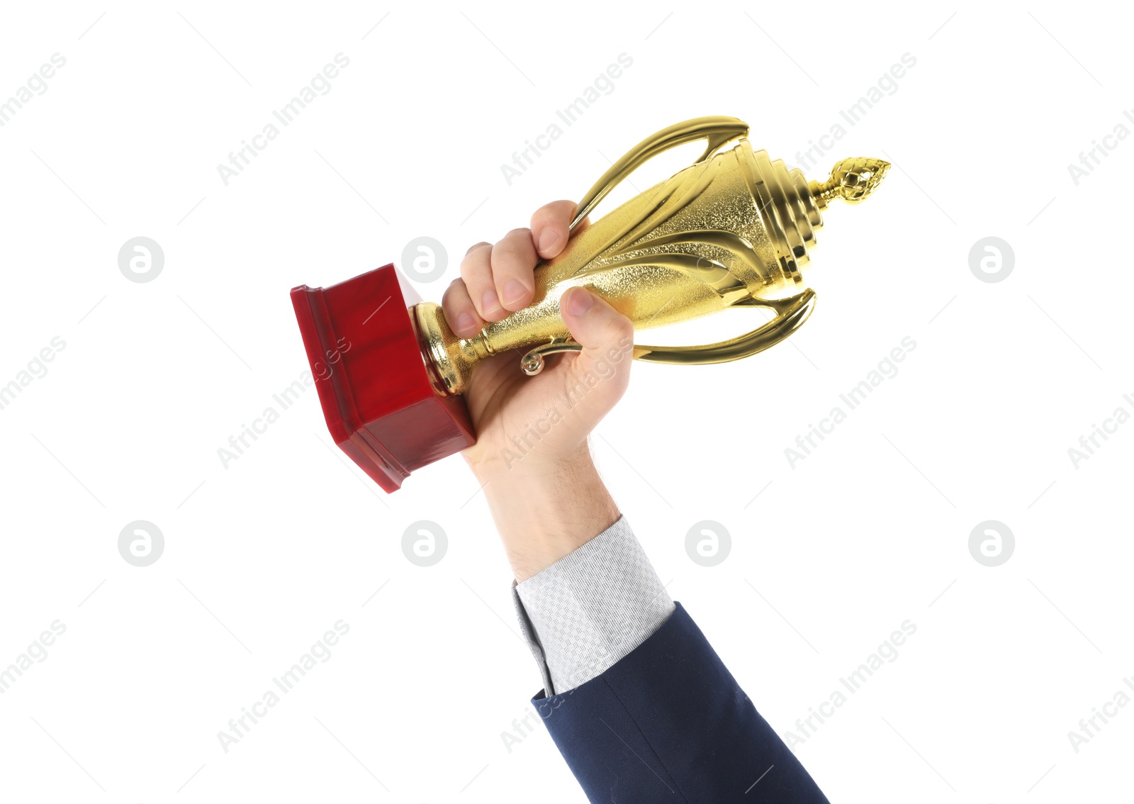 Photo of Businessman holding gold trophy cup on white background, closeup