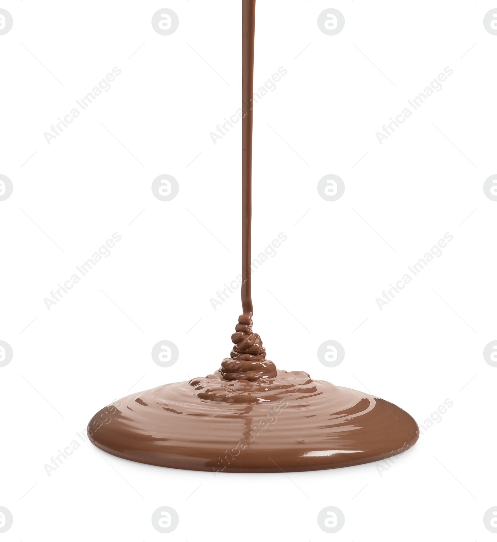 Photo of Pouring tasty melted milk chocolate isolated on white