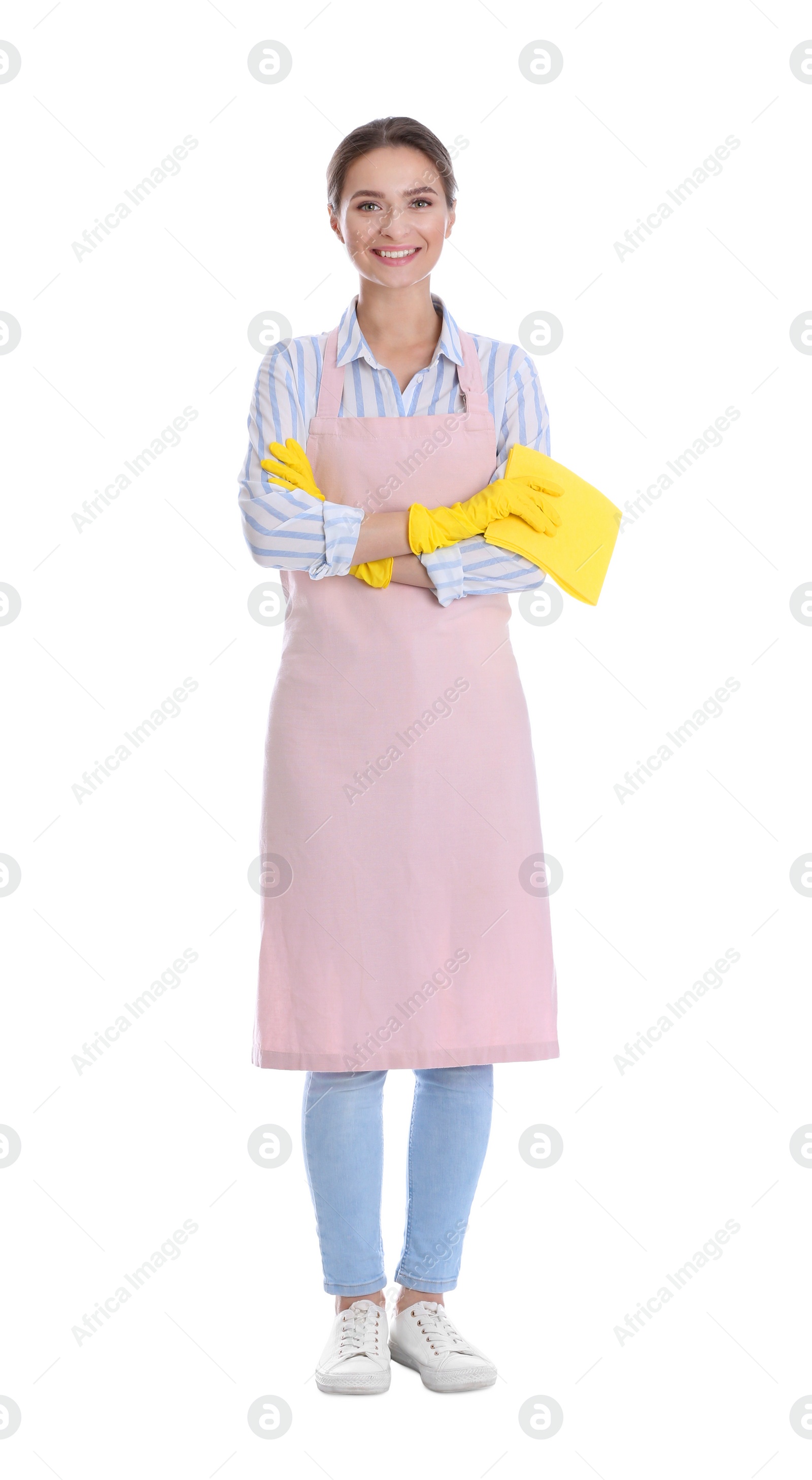 Photo of Young chambermaid with rag on white background