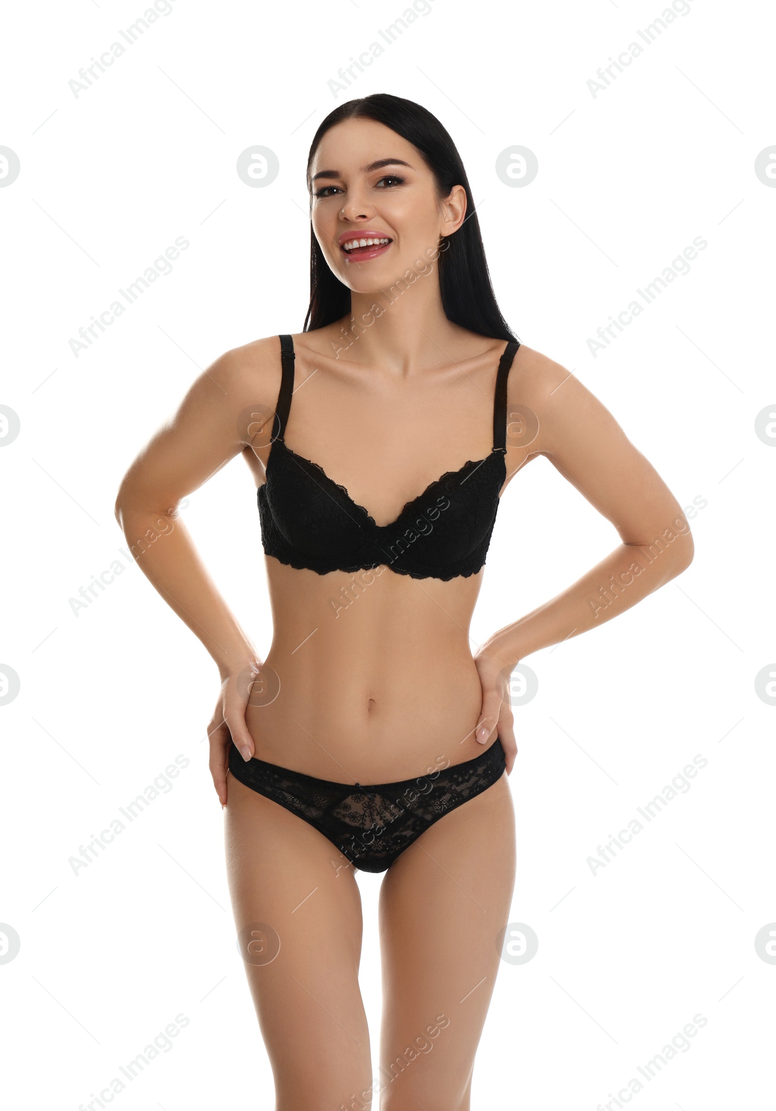 Photo of Beautiful young woman in black underwear isolated on white