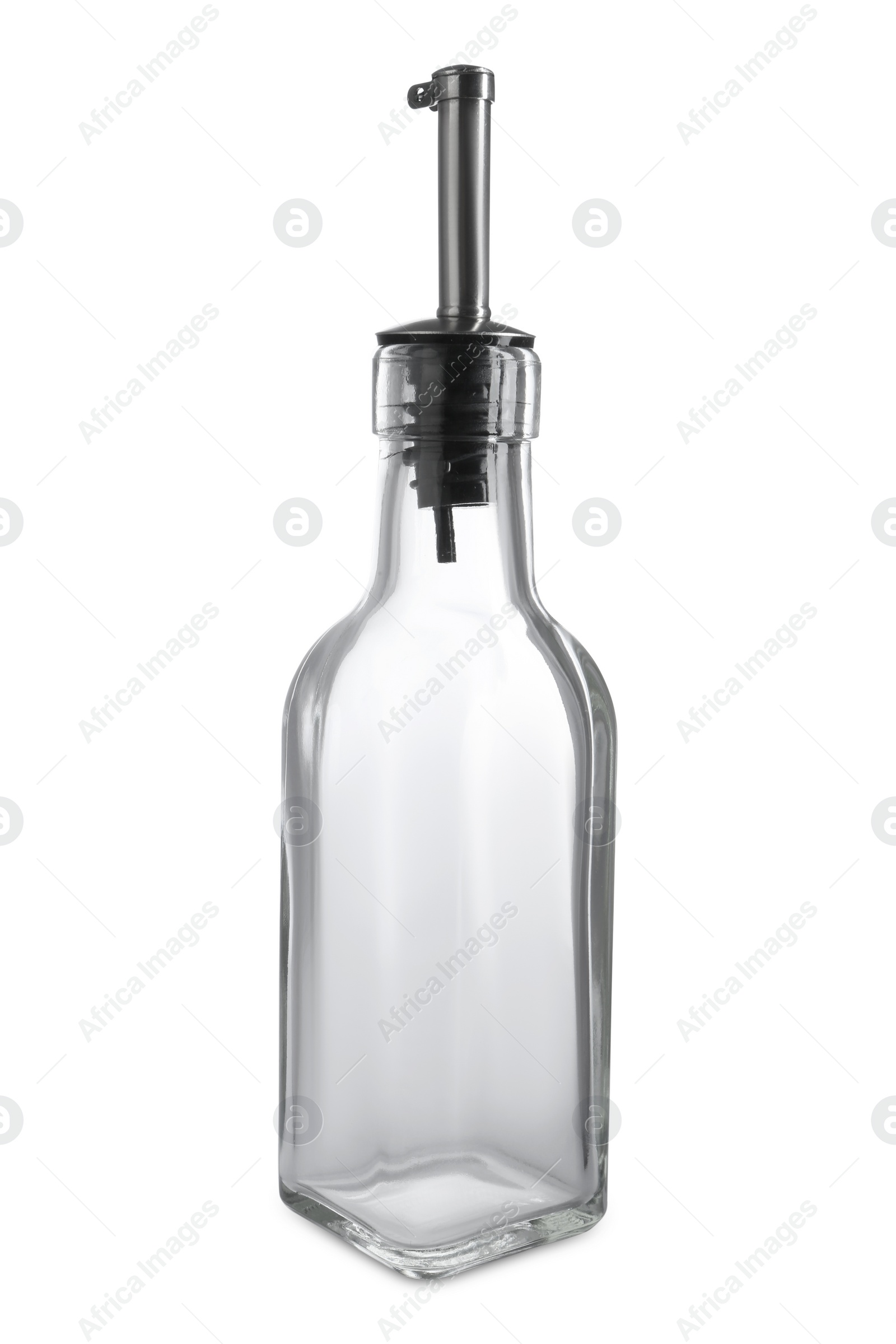 Photo of Empty glass bottle with pump for oil on white background