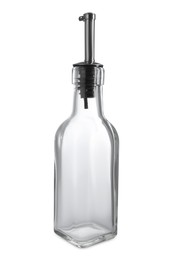 Photo of Empty glass bottle with pump for oil on white background