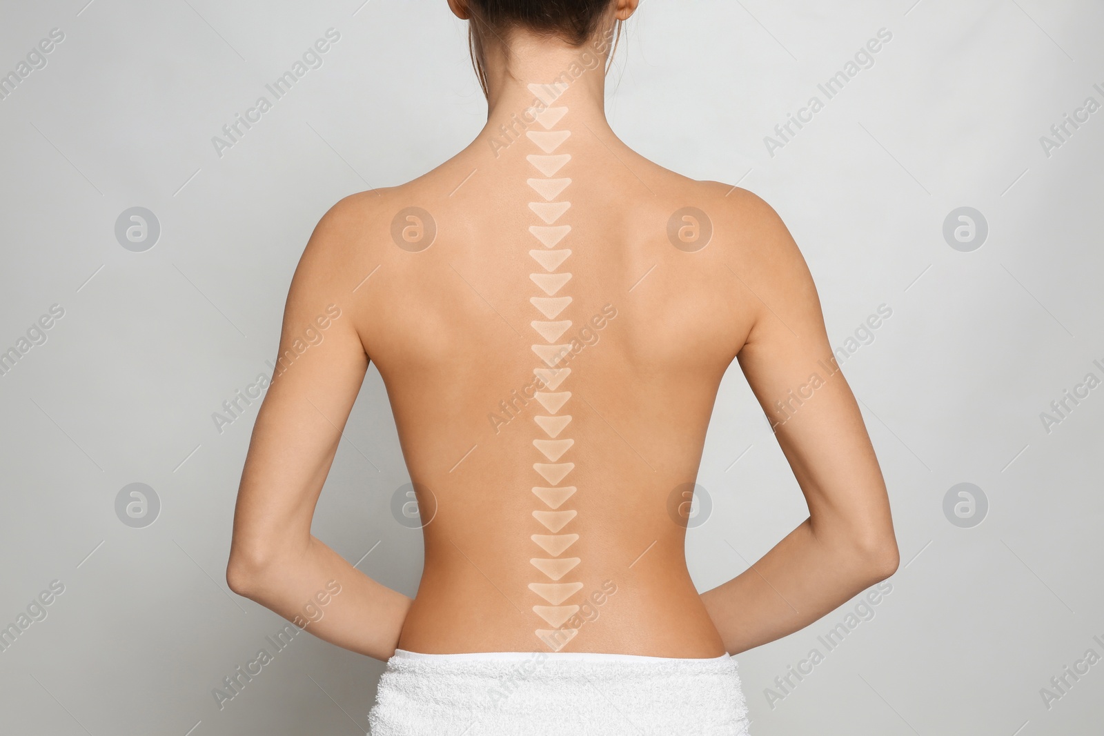 Image of Woman with healthy back on light background, closeup. Illustration of spine