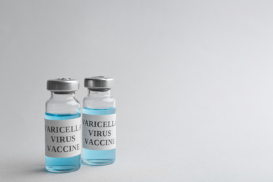 Chickenpox vaccine on light grey background, space for text. Varicella virus prevention