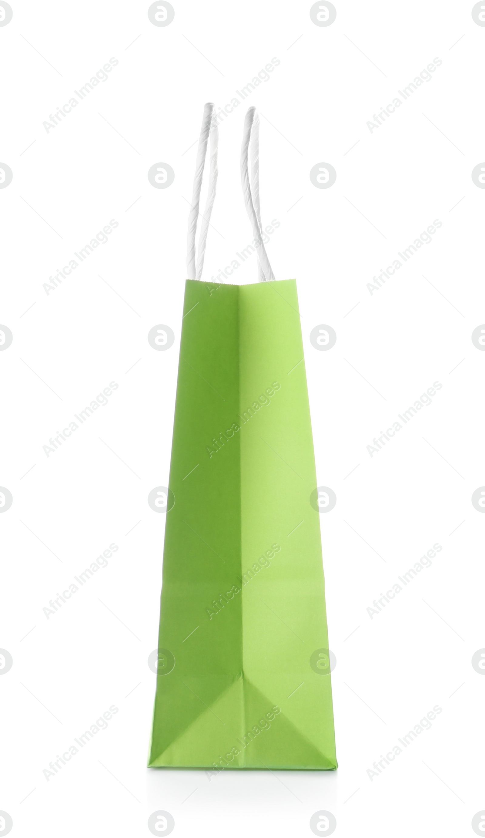 Photo of Empty paper shopping bag on white background