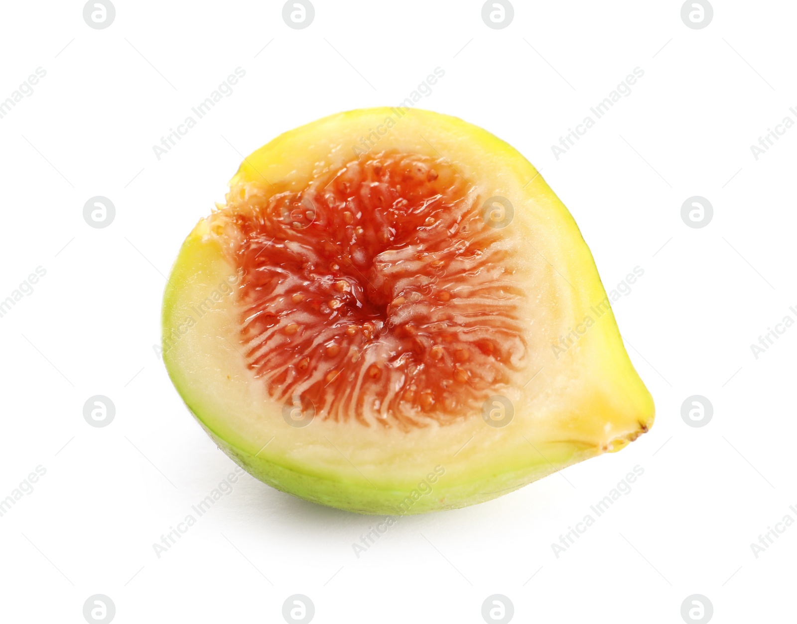 Photo of Half of ripe green fig on white background