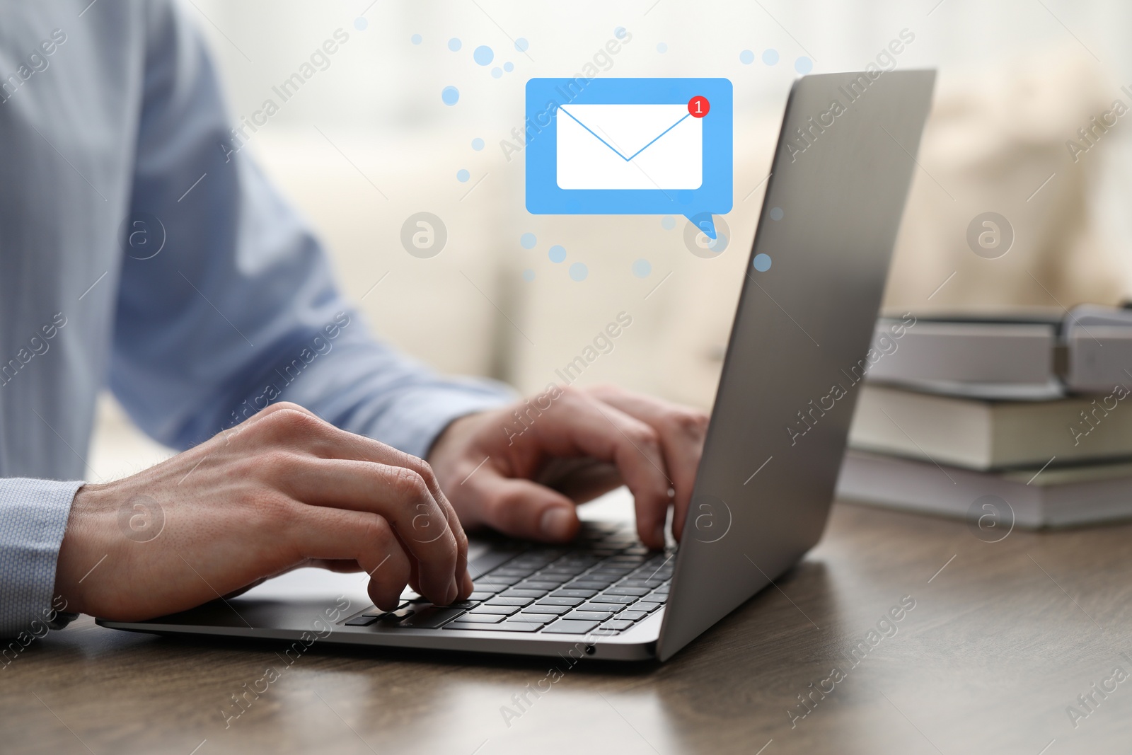 Image of Email. Man using laptop indoors, closeup. Incoming letter notification near device