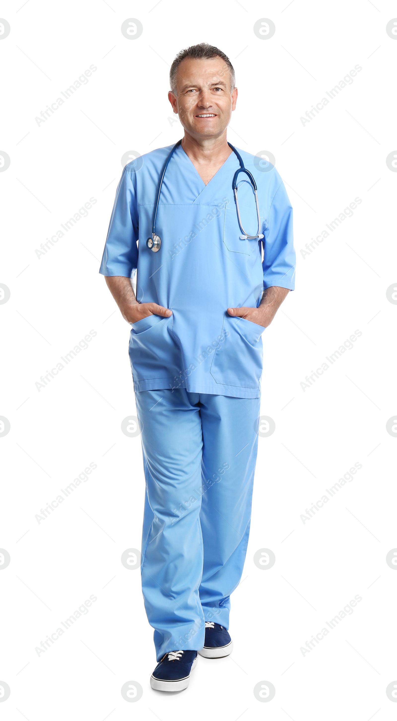 Photo of Full length portrait of experienced doctor in uniform on white background. Medical service