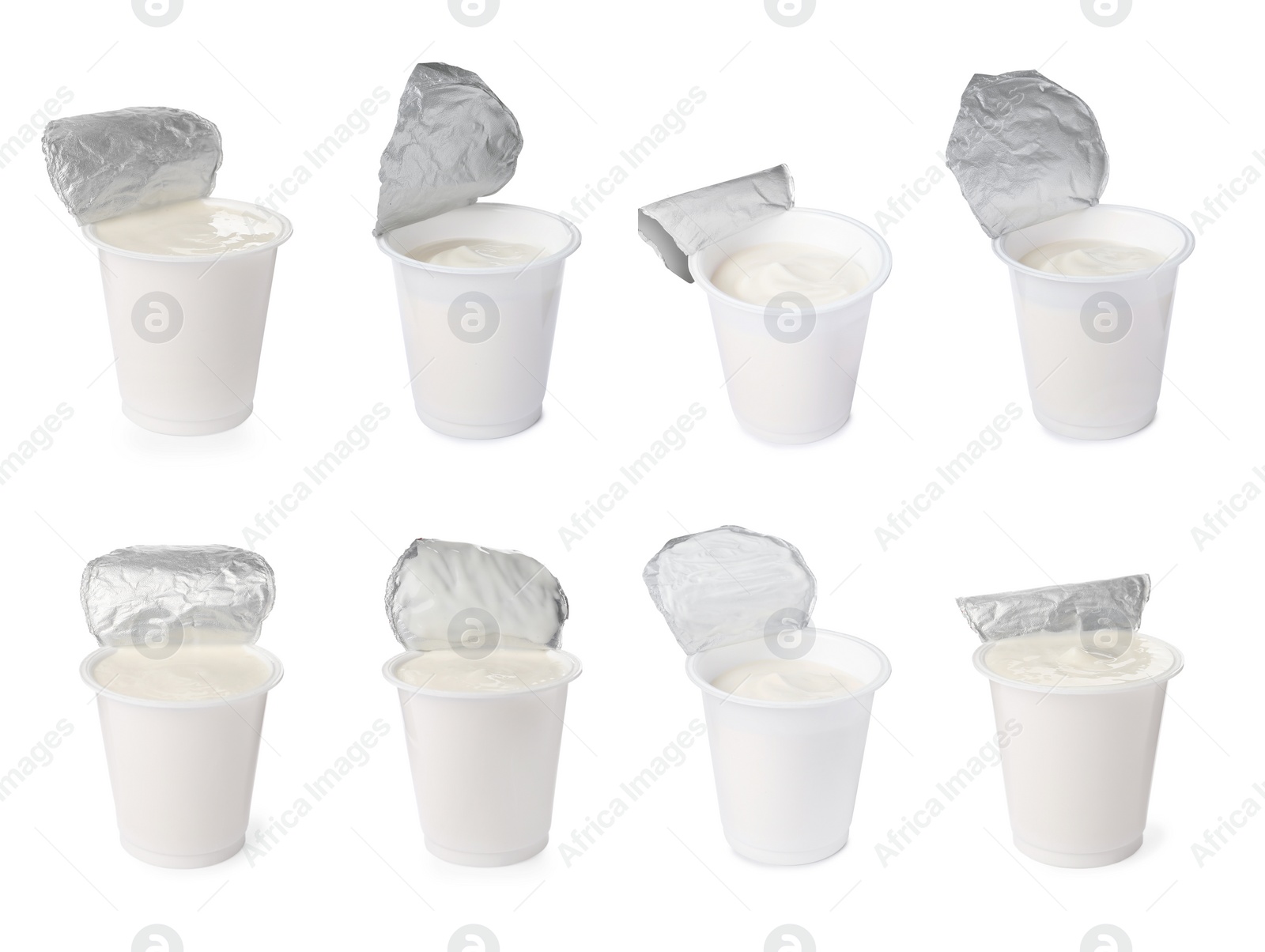 Image of Set with delicious organic yogurts on white background