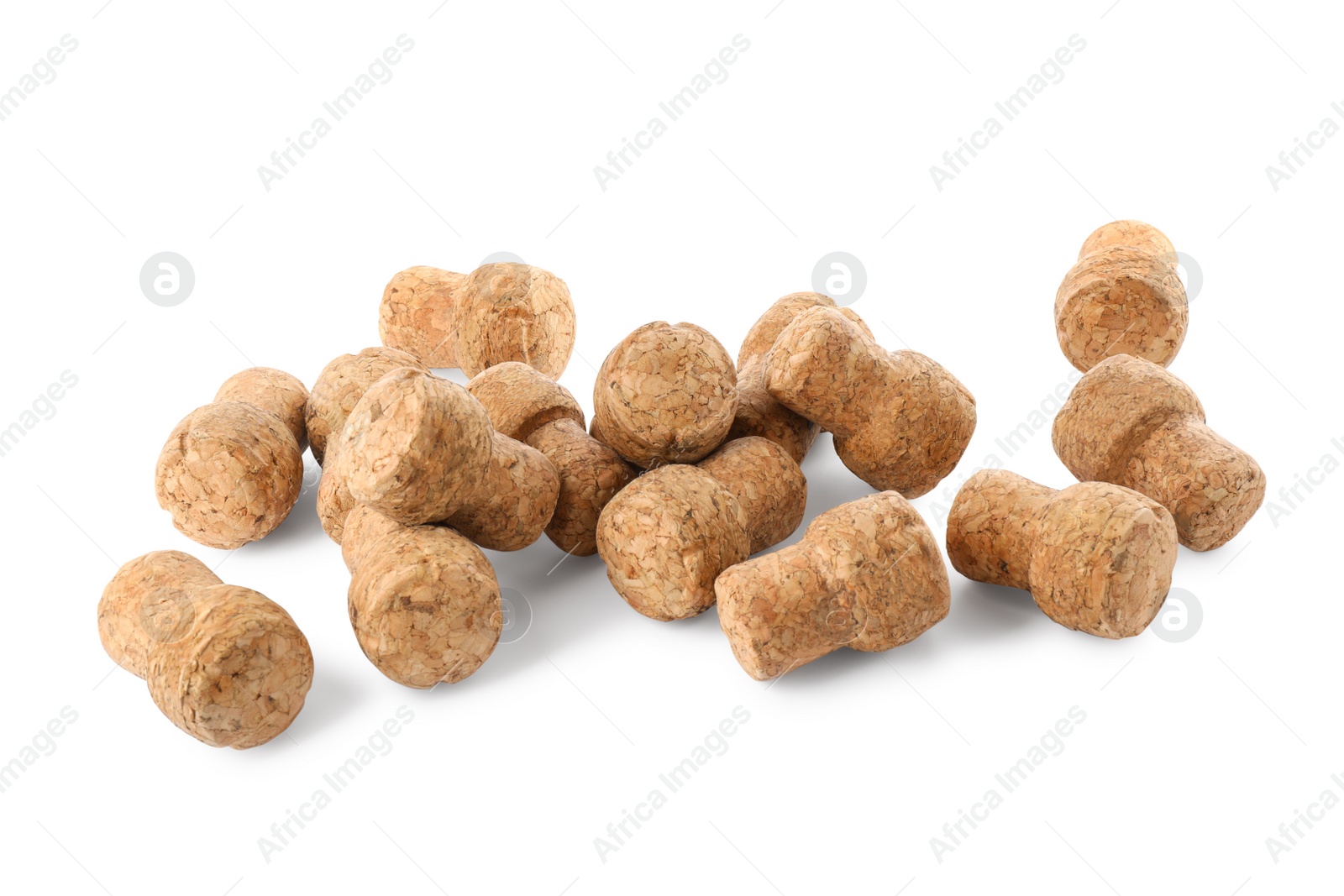 Photo of Heap of sparkling wine corks on white background