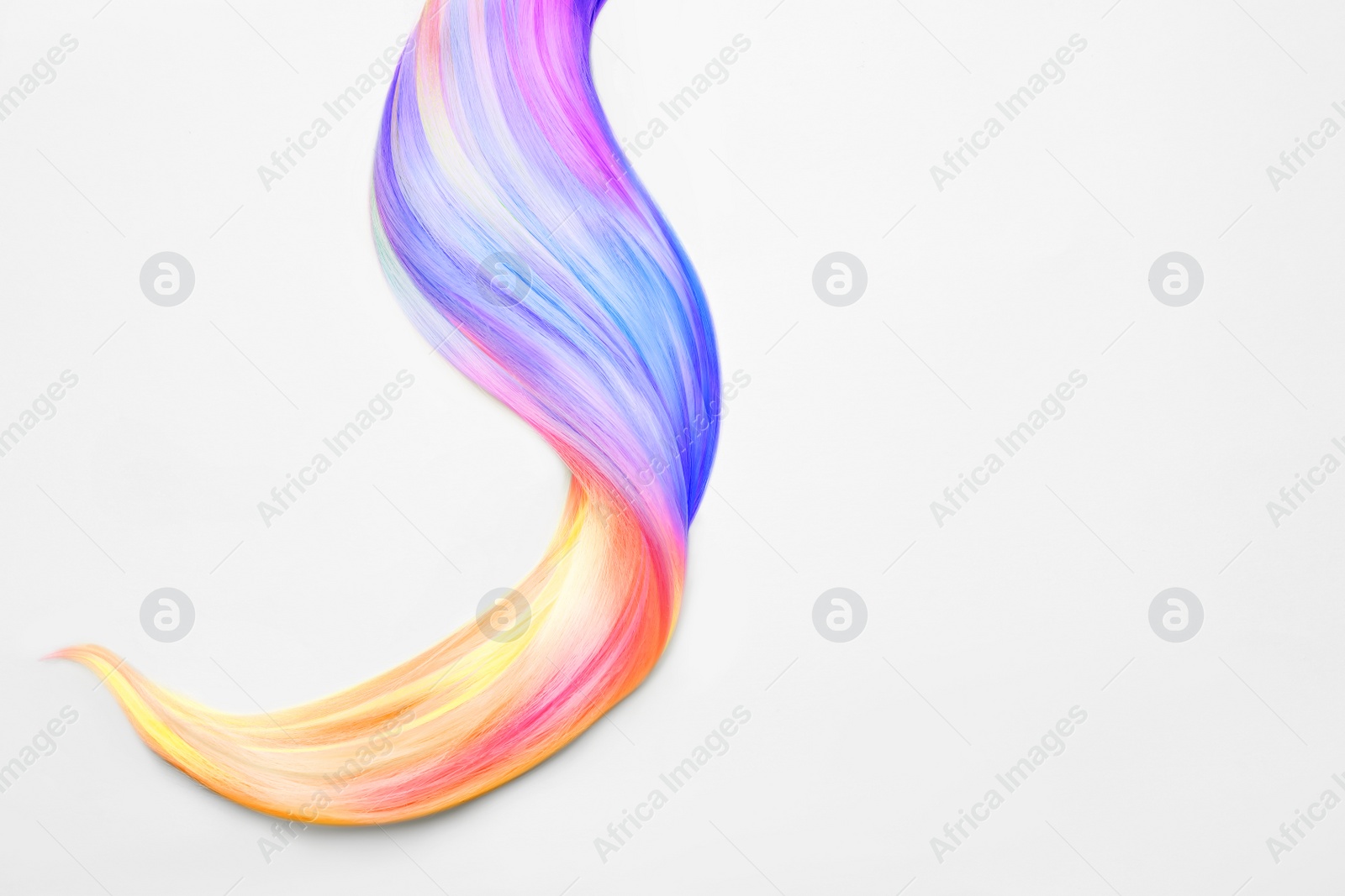 Image of Strand of beautiful multicolored hair on white background, top view