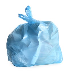 Photo of Blue trash bag full of garbage isolated on white