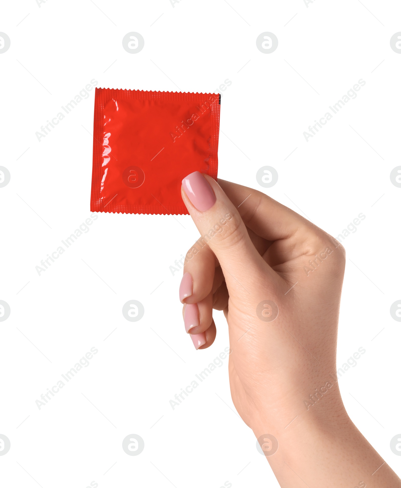 Photo of Woman holding condom on white background, closeup