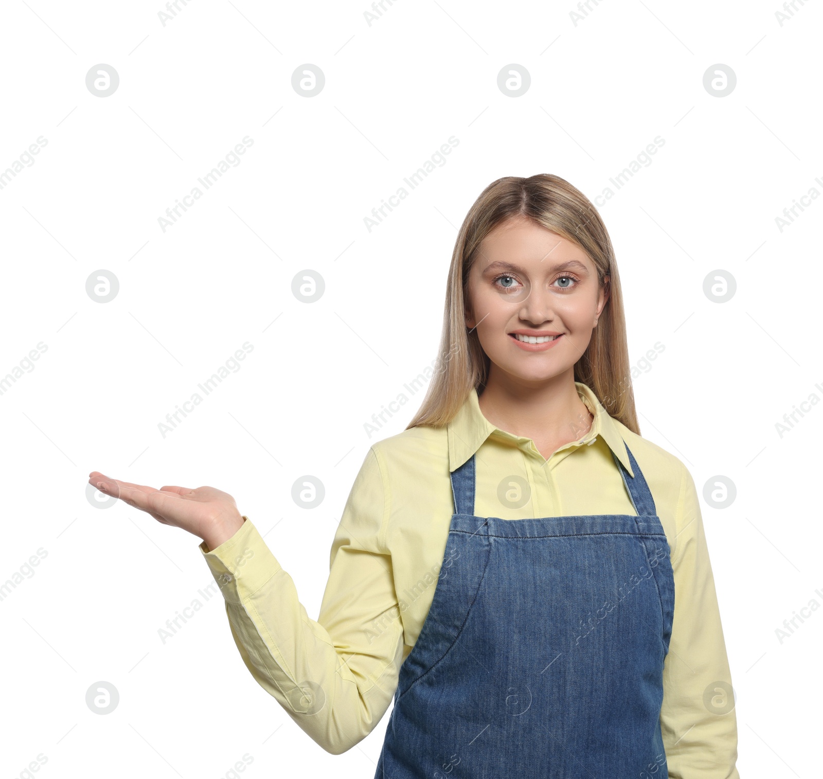 Photo of Beautiful young woman in denim apron on white background