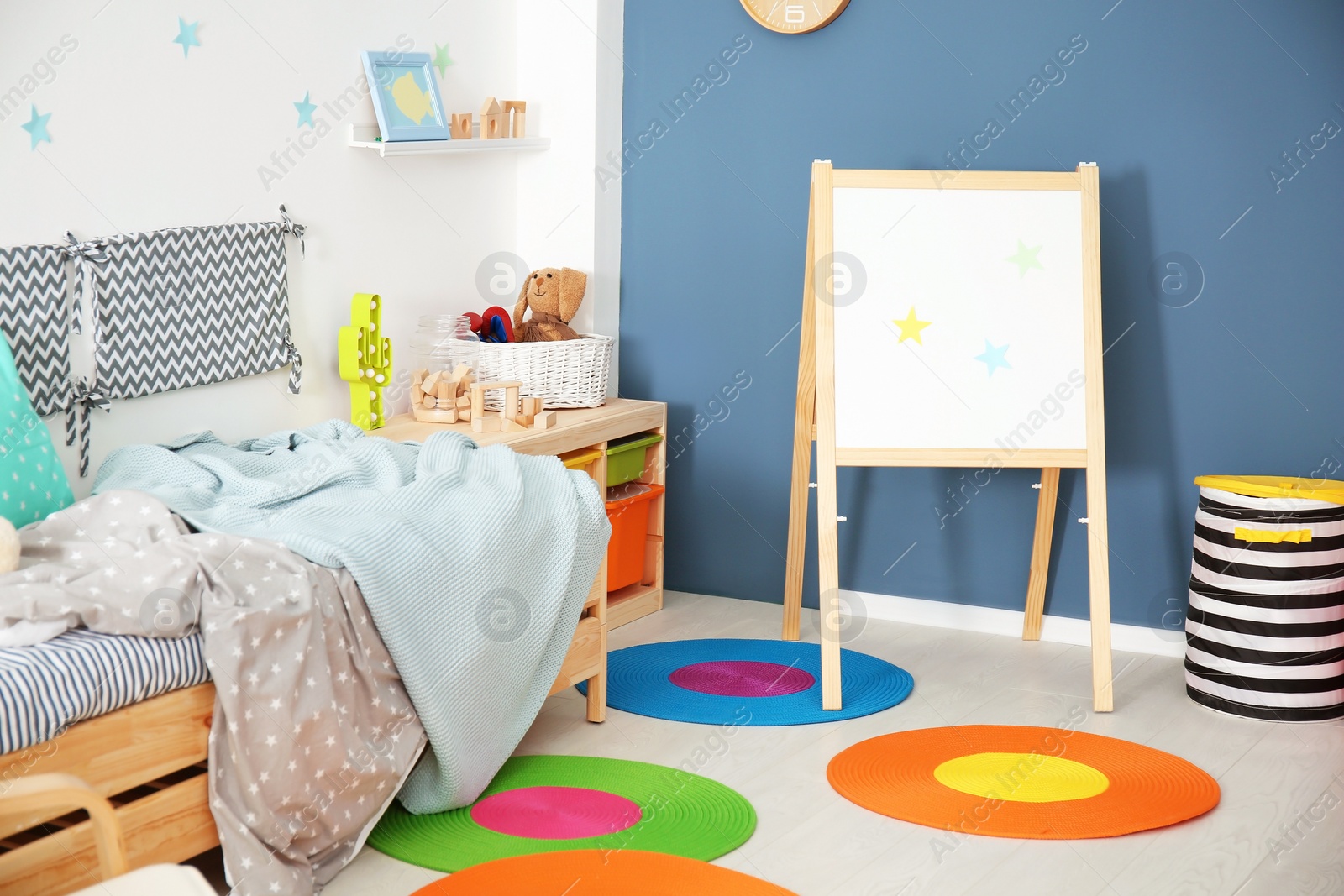 Photo of Modern child room interior with comfortable bed