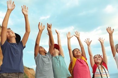 Image of Happy little children outdoors on sunny day. Camping trip