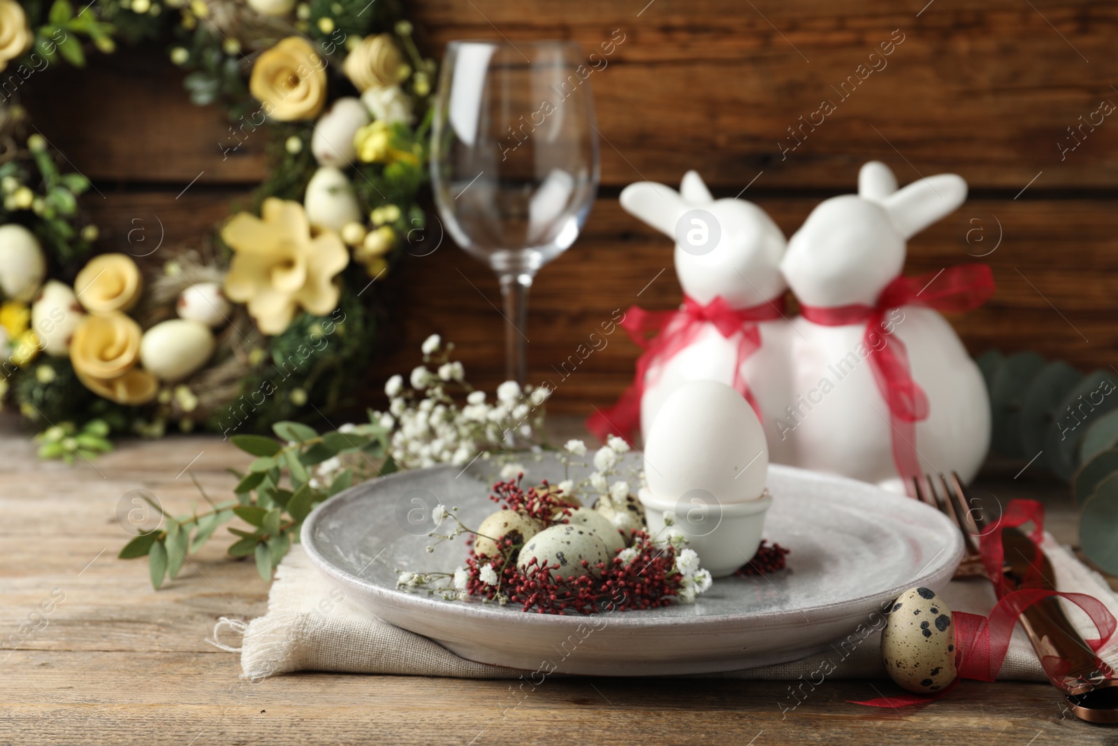 Photo of Festive Easter table setting with beautiful floral decor