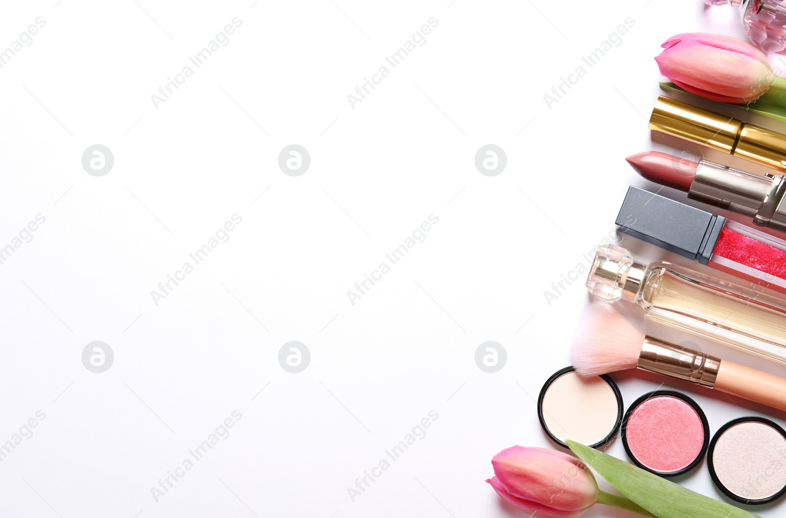 Photo of Different makeup products and flowers on white background, top view