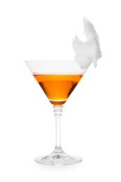 Photo of Alcohol cocktail in glass decorated with cotton candy isolated on white