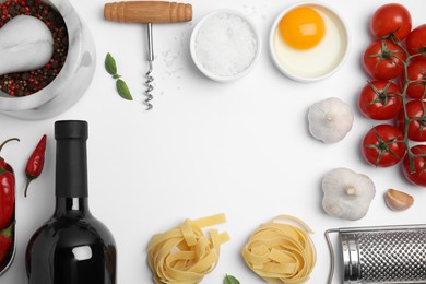 Photo of Composition with wine and fresh ingredients on white background, top view. Space for text