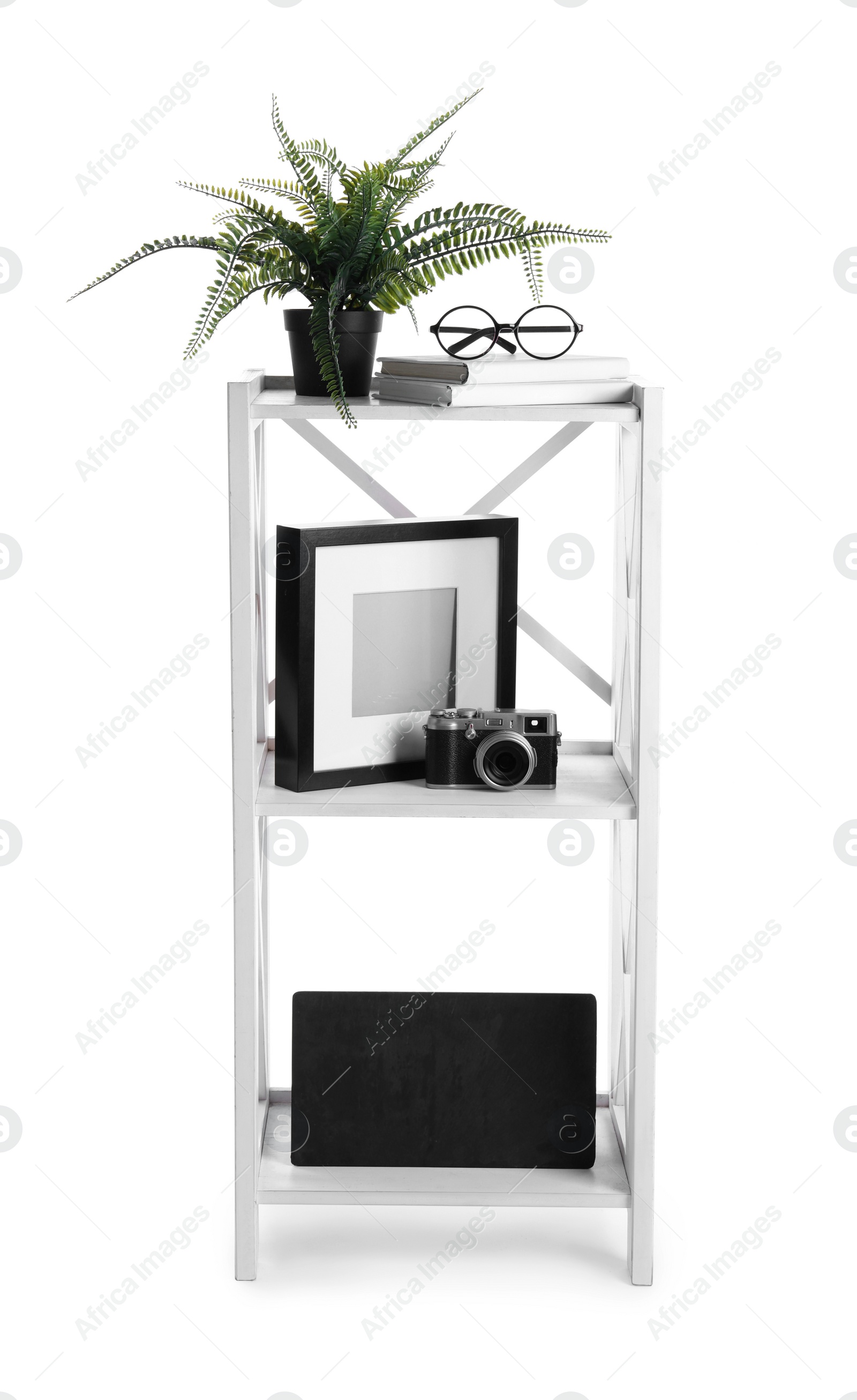 Photo of Wooden shelving unit with different items isolated on white