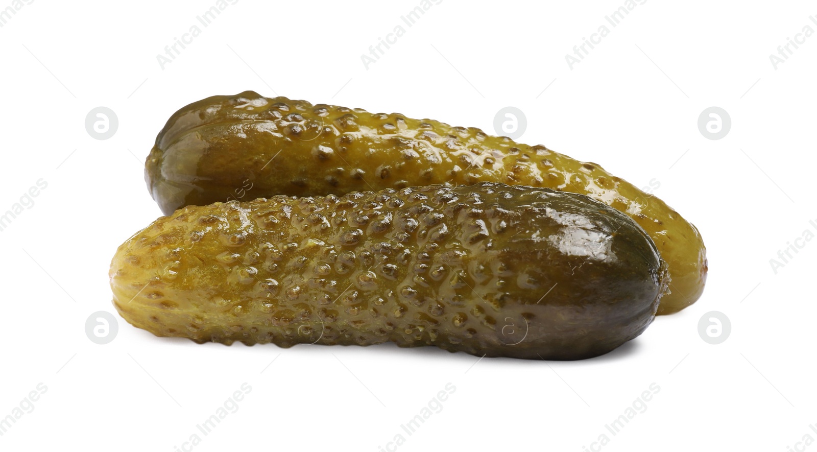 Photo of Two tasty pickled cucumbers isolated on white