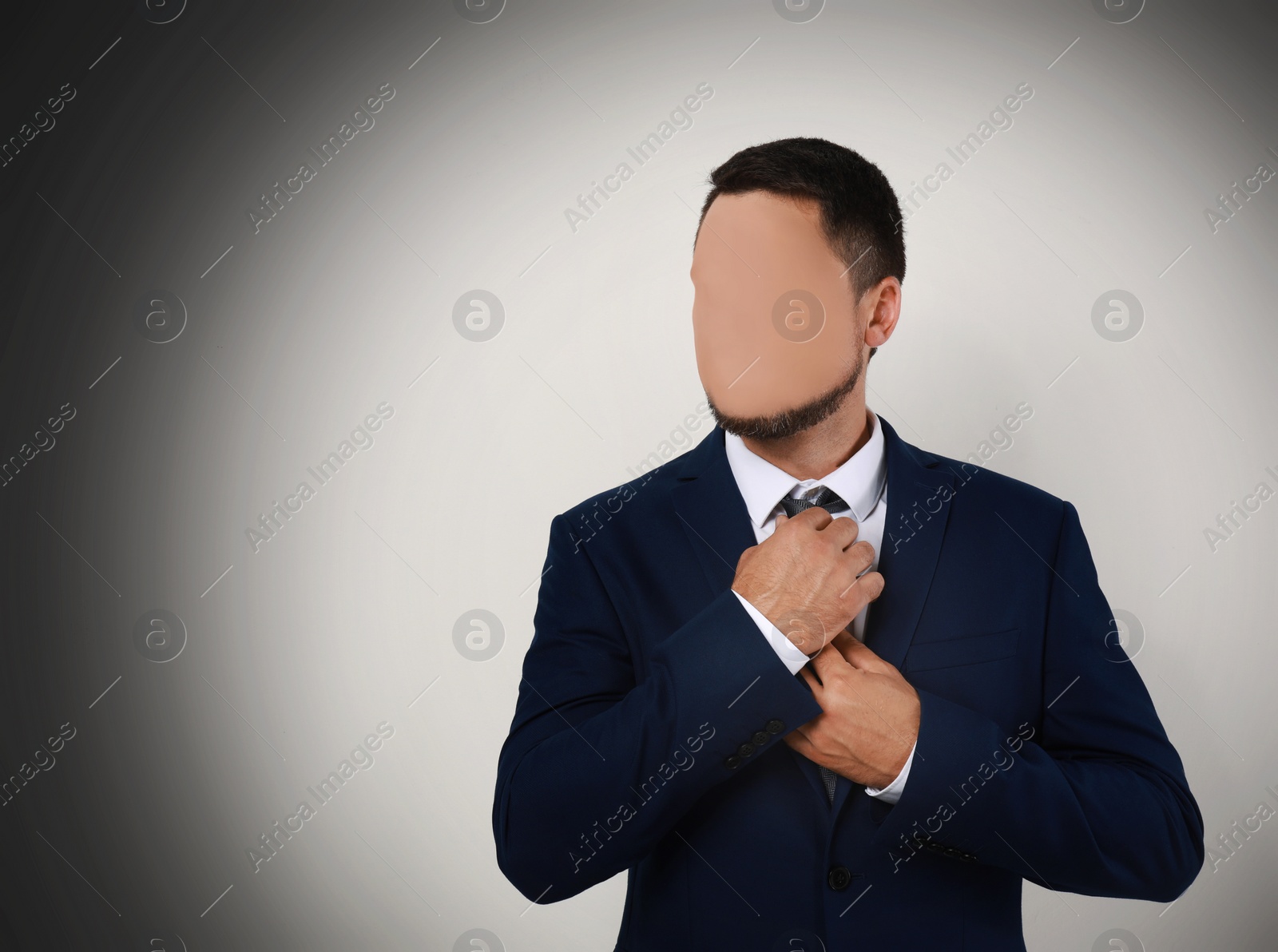 Image of Anonymous. Faceless man in suit on dark background, space for text