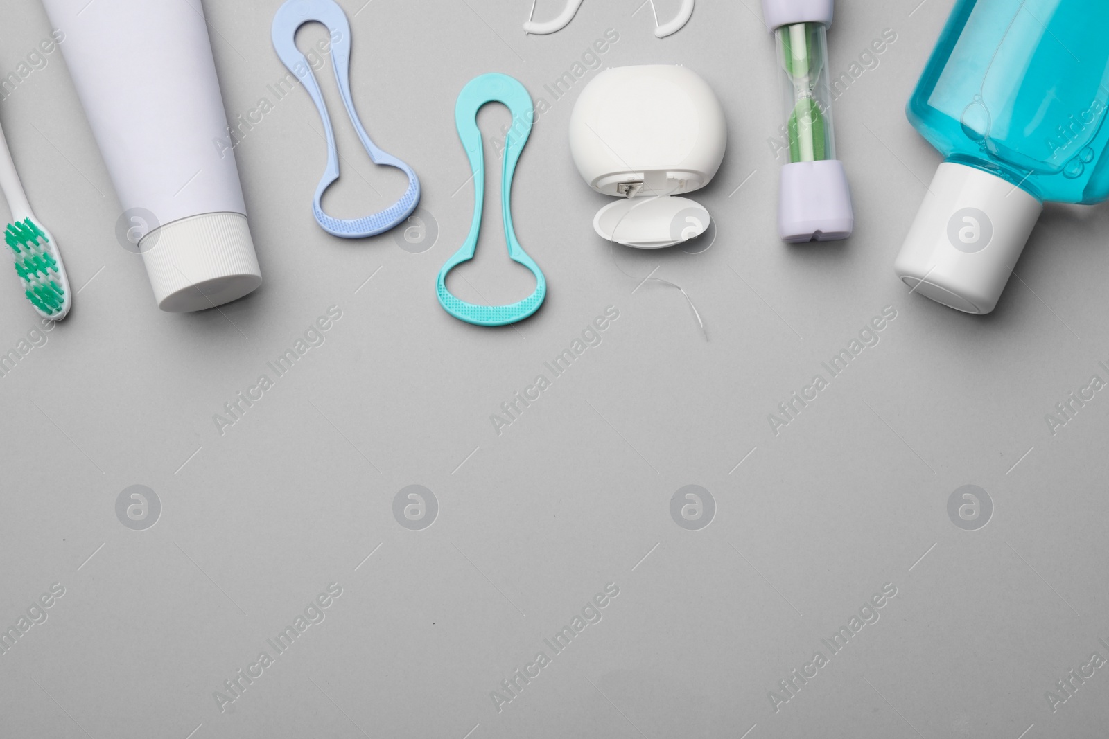 Photo of Flat lay composition with tongue cleaner on color background, space for text