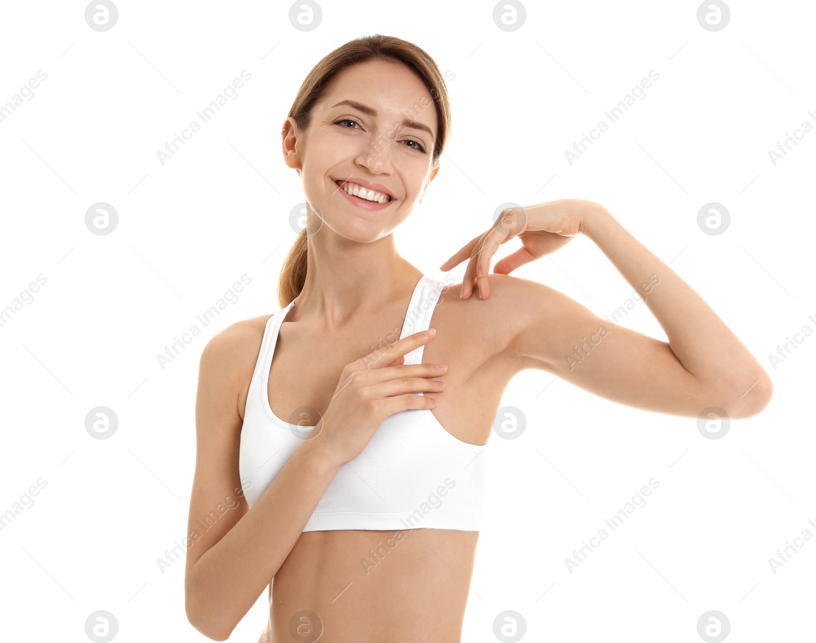 Photo of Young woman showing smooth silky skin after epilation on white background