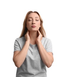 Photo of Young woman doing thyroid self examination on white background