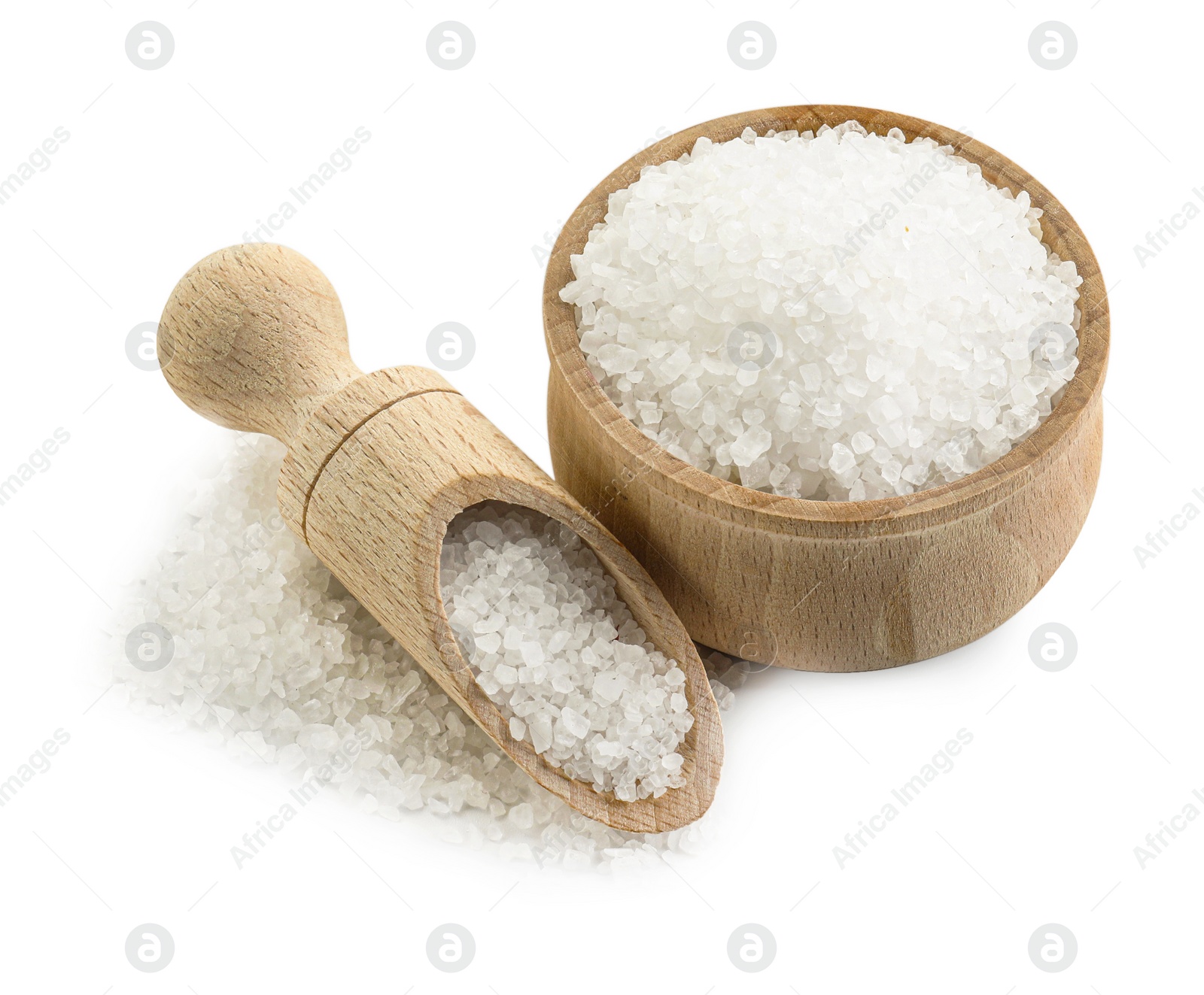 Photo of Natural salt in wooden bowl and scoop isolated on white