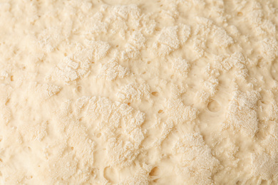 Tasty dough for pastries as background, closeup view