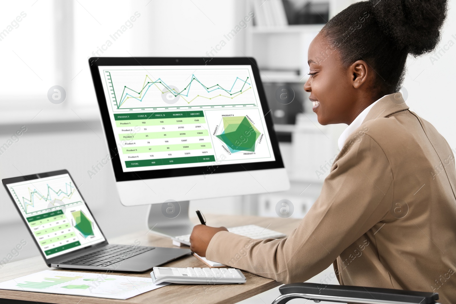 Photo of Professional accountant working at wooden desk in office