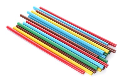 Photo of Many colorful glue sticks on white background