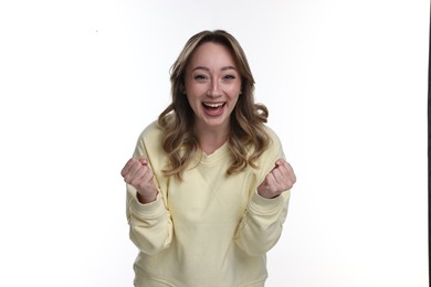 Photo of Portrait of happy surprised woman on white background