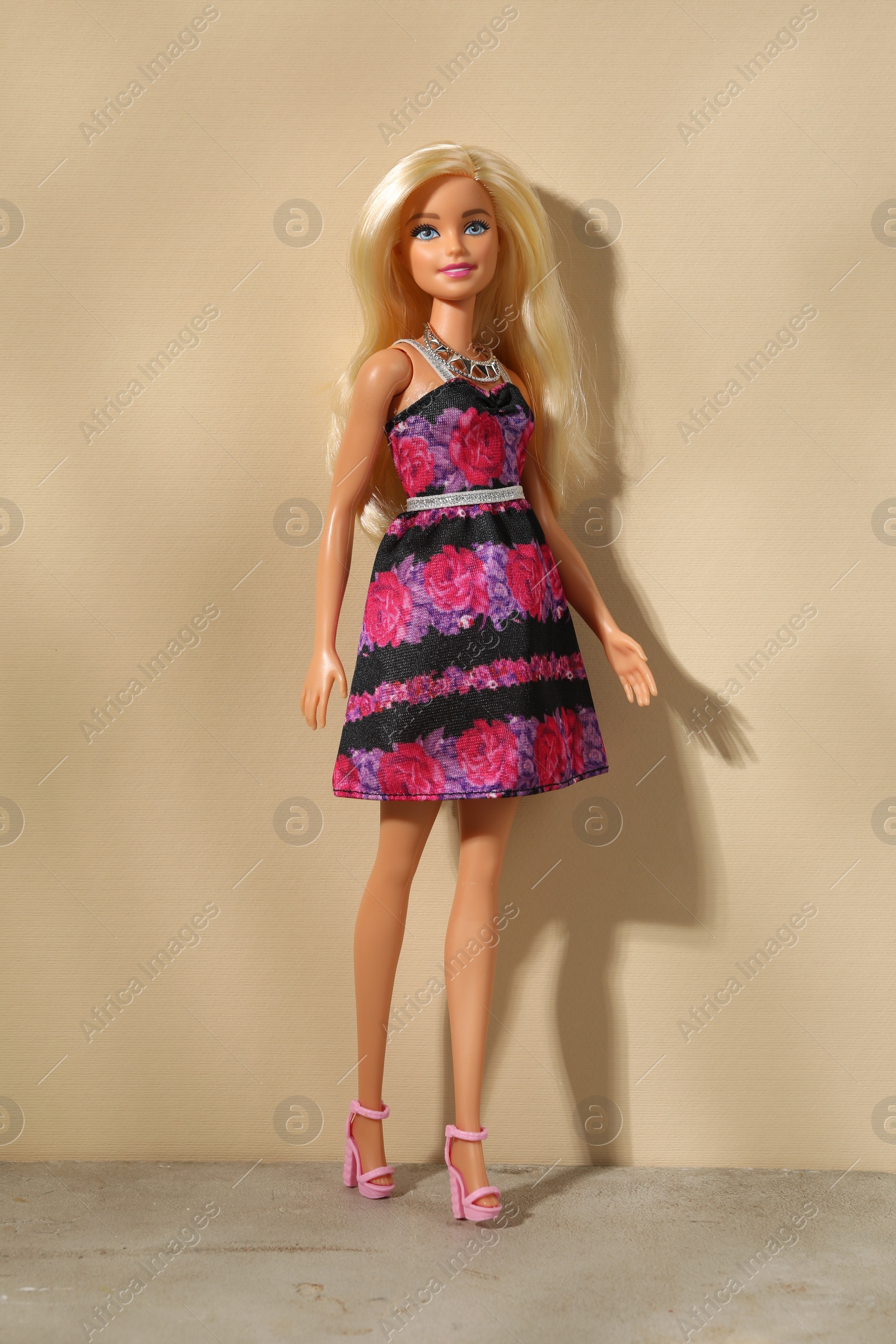 Photo of Mykolaiv, Ukraine - September 4, 2023: Beautiful Barbie doll on beige background