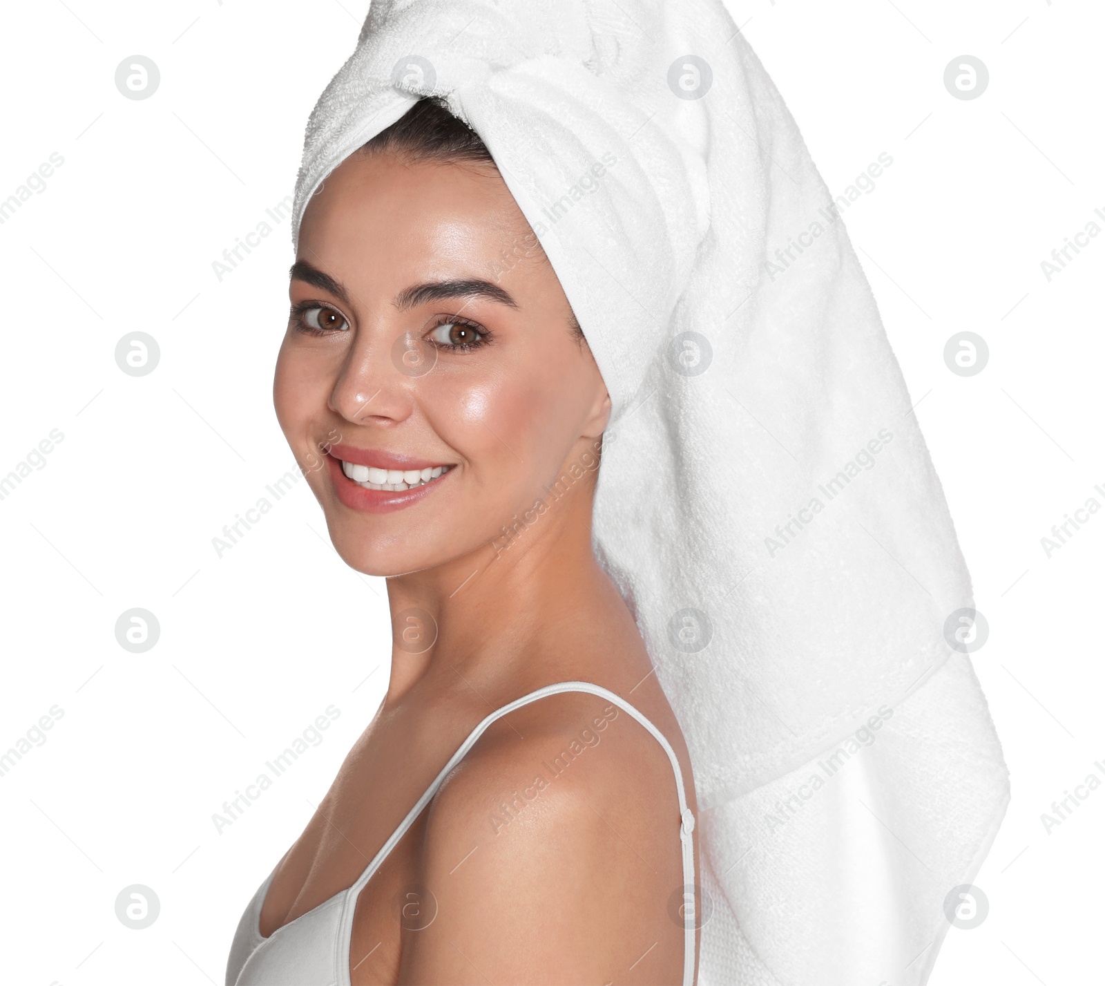 Photo of Beautiful young woman with towel on head against white background